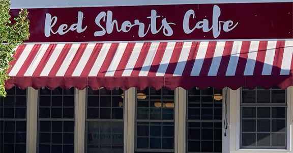 red shorts cafe promo image